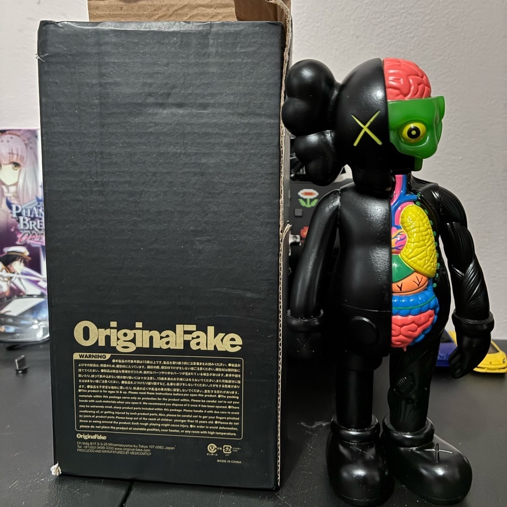 OriginalFake Black and Multicolor Figure